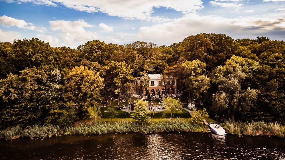 Snagov Mansion from above, nestled in the forest on the shore of Lake Snagov